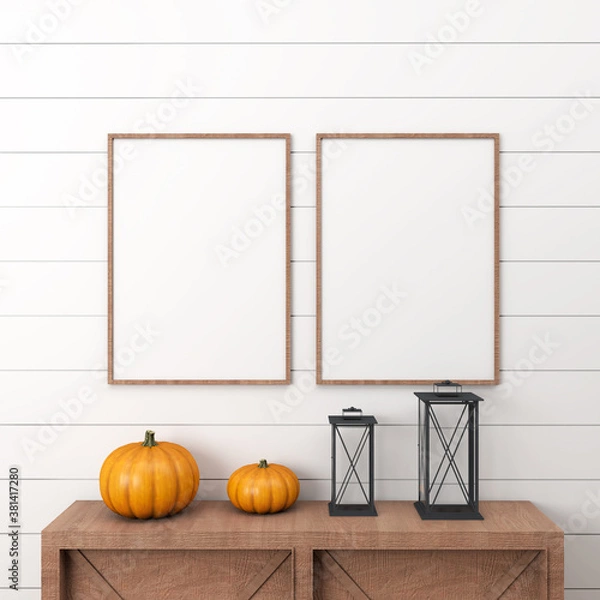 Fototapeta Two wooden halloween frames on a white wall, with a drawer with two pumpkins and black lanterns