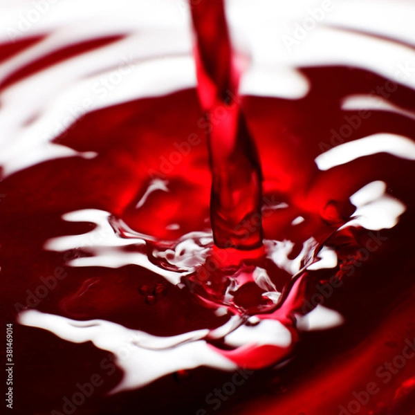 Fototapeta Red wine fresh spashed with reflexes