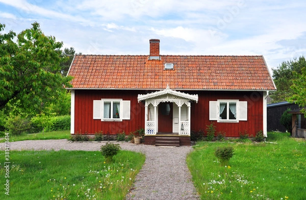 Obraz Typical idyllic red cottage in Sweden