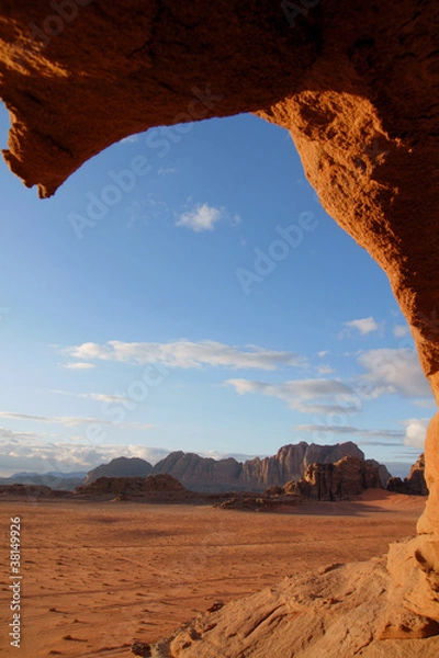 Fototapeta Through a hole in the rock, Wadi Rum