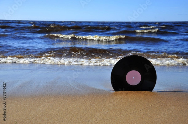 Obraz Vinyl record on the sand.