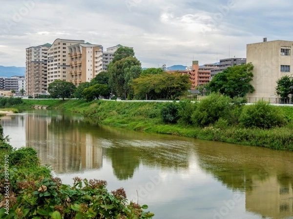 Fototapeta 川沿いの都市風景