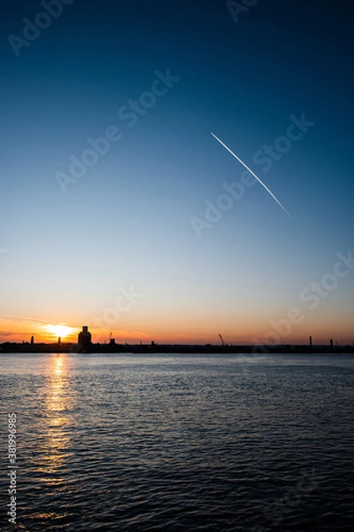Fototapeta Liverpool, UK. Beautiful colorful long exposure shot of river Mersey from Albert Dock with smooth reflections of night lights from the other side of a shore. 