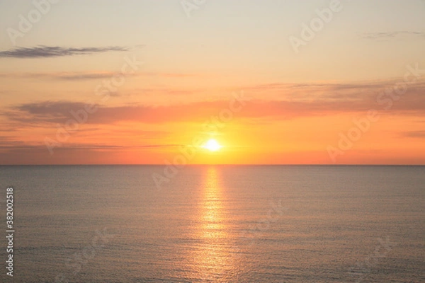 Fototapeta 水平線と日の出