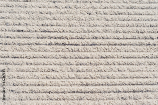 Obraz Light grey sand with horizontal rake lines