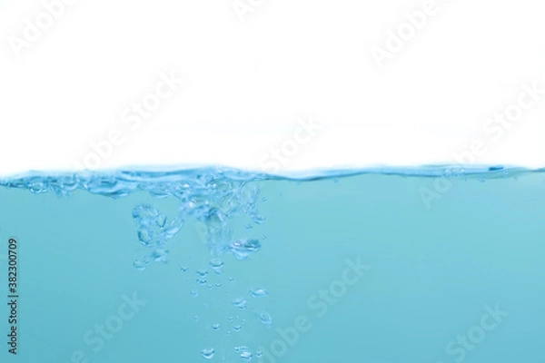 Obraz Water waves and light blue water droplets crystal clear on white background