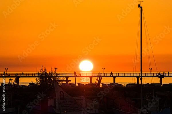 Obraz Stimmungsvoller Sonnenuntergang über der Seebrücke von Kühlungsborn