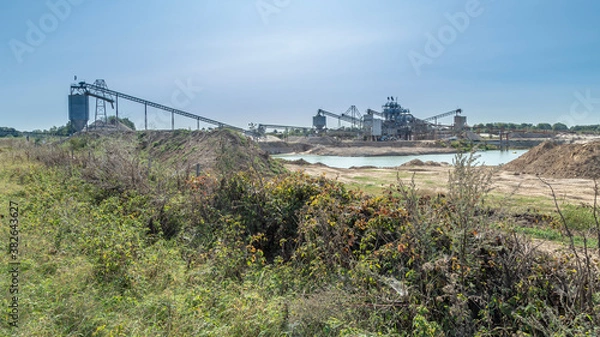 Fototapeta Sand mining factory near river Waal in Millingen aan de Rijn, Gelderland, Netherlands