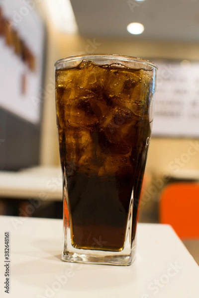 Fototapeta soft drink being into glass