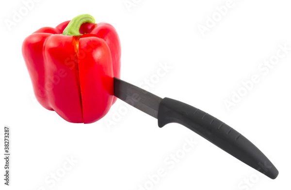 Obraz Paprika with ceramic knife