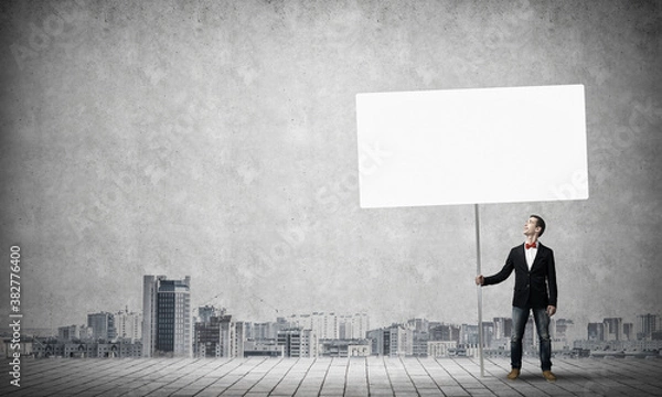 Fototapeta Guy with white billboard