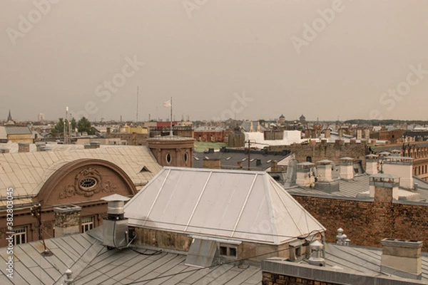 Fototapeta Location - Riga, Latvia. Shoot date - 10/04/2020. Top view of the Latvian capital Riga in Autumn. Top view of old town Riga. Vintage.
