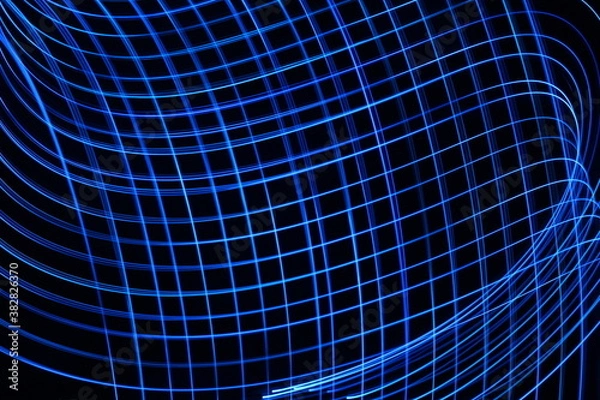 Fototapeta Long exposure photograph of neon blue colour in an abstract swirl, parallel lines pattern against a black background. Light painting photography.