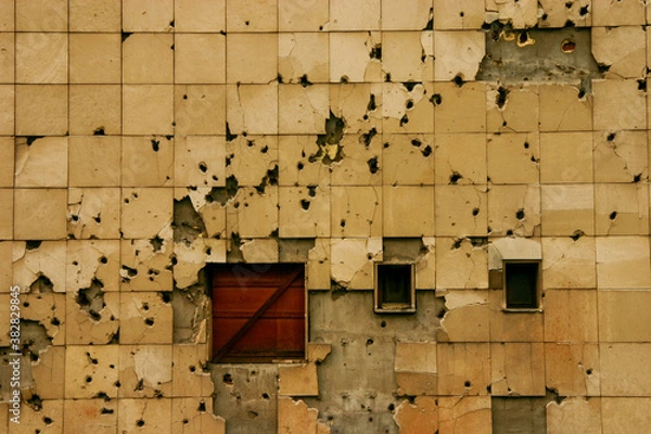 Fototapeta Traces of the Bosnian War, Bullet holes on wall of building in Sarajevo, Bosnia and Herzegovina