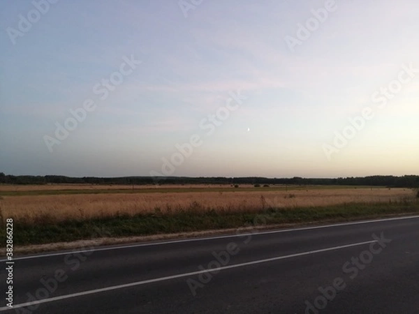 Obraz sunset over the road