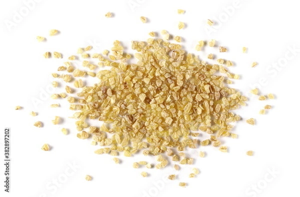 Fototapeta Dry bulgur pile isolated on white background, top view and clipping path