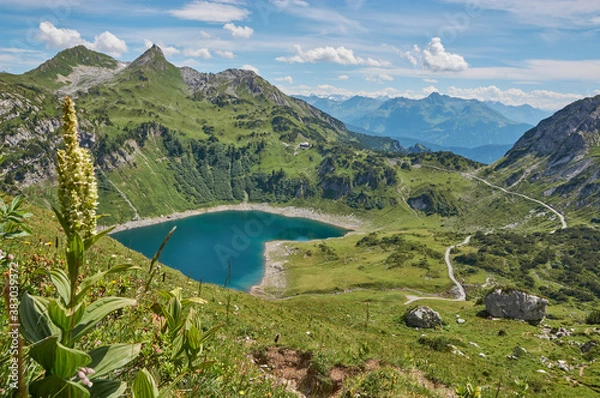 Fototapeta Panoramic mountain landscape with mountain lake in austria. Beautiful mountain lake in the austrian alps.