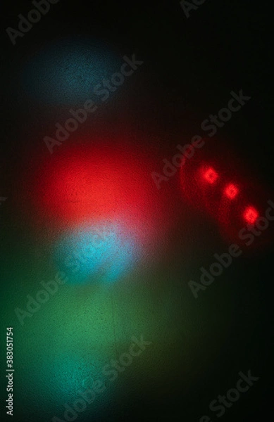 Fototapeta Lichtfigur hinter grobem Milchglas