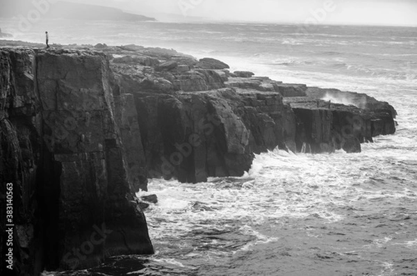 Obraz Black and white seascape of Irish cliffs battered by waves, Ireland