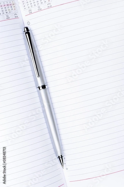Obraz silver pen on notebook vertical