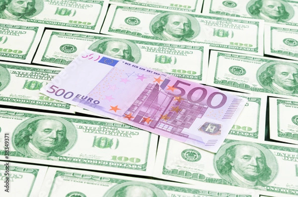 Obraz Euro banknote lying on the dollars background
