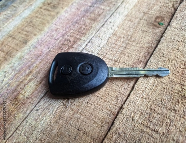 Obraz car keys on a wooden background