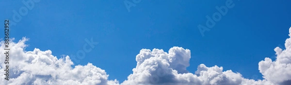 Fototapeta Narrow photo of clouds in the sky. Banner from the sky.