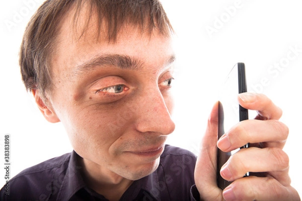Obraz Ugly weirdo man looking at cellphone