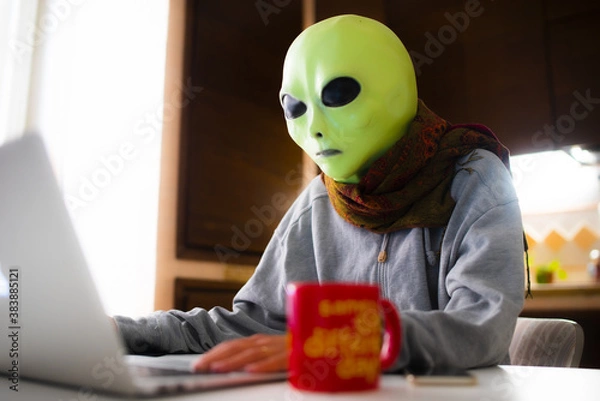 Fototapeta smart working. alien at work in the house. same shit different day