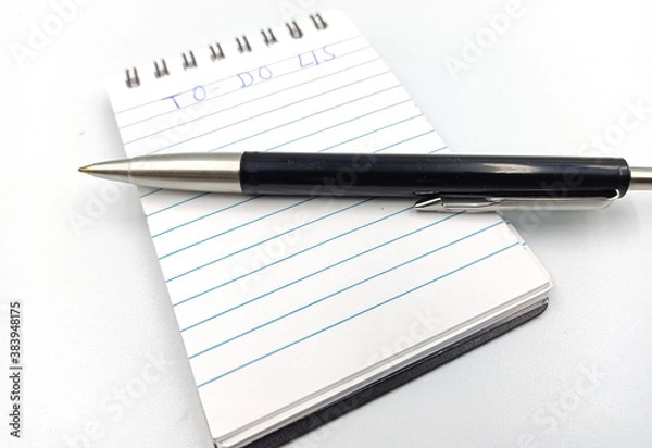 Fototapeta notebook with to do list on white background, planning and design concept
