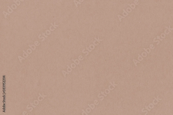 Fototapeta A vintage rough sheet of the carton with a gradient color. Recycled environmentally friendly retro cardboard paper texture. Simple and bright minimalist papercraft background.