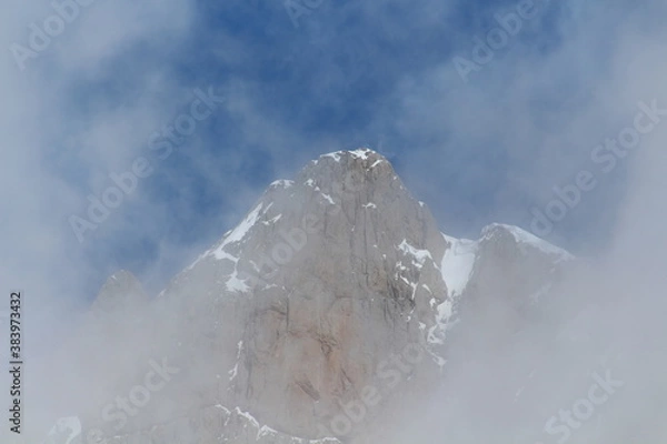 Fototapeta Summits, fog, remnants of snow ... The end of winter.