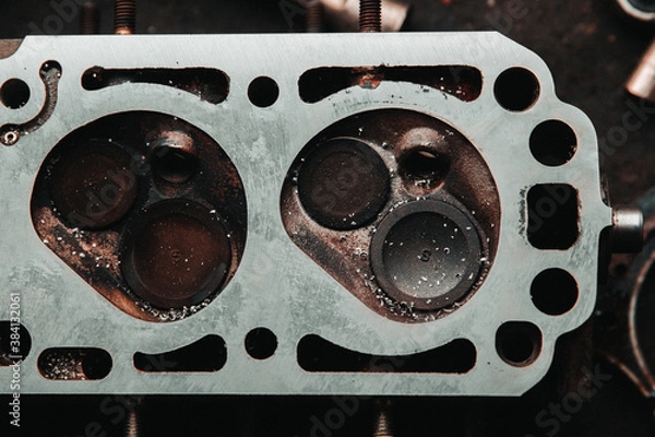 Obraz repair of an old engine car disassembled head and valves