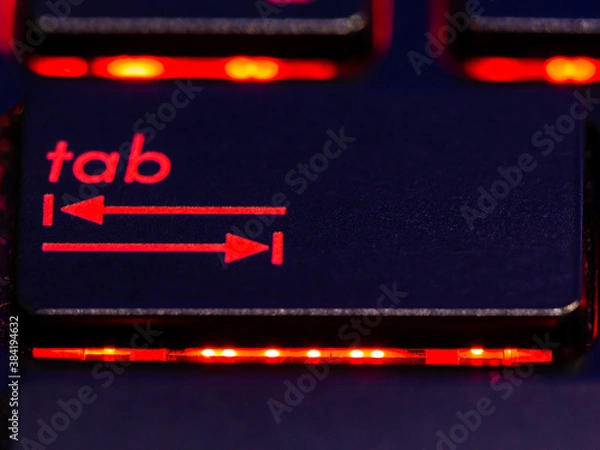 Obraz Black keyboard tab key with red backlight