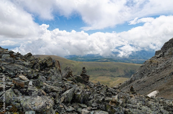 Obraz Cloudy skies and mountain ranges
