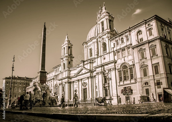 Fototapeta Navona square, St. Agnes Church and the fountain of the Four rivers in Rome on a Sunny may morning. Rome, Lazio, Italy