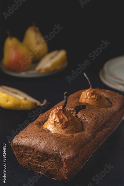 Obraz Homemade vegan chocolate cake with poached pears. Close-up view.