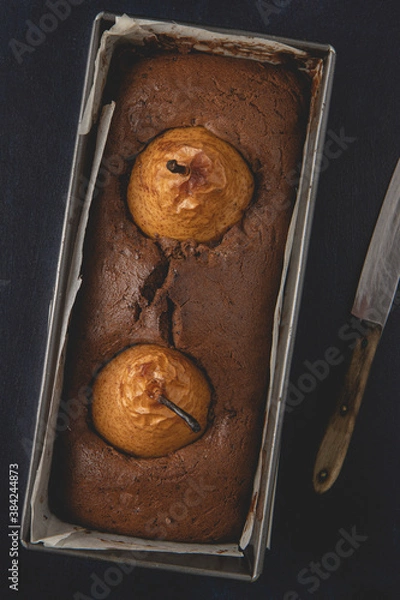 Obraz Homemade vegan chocolate cake with poached pears. Top view, flat lay.