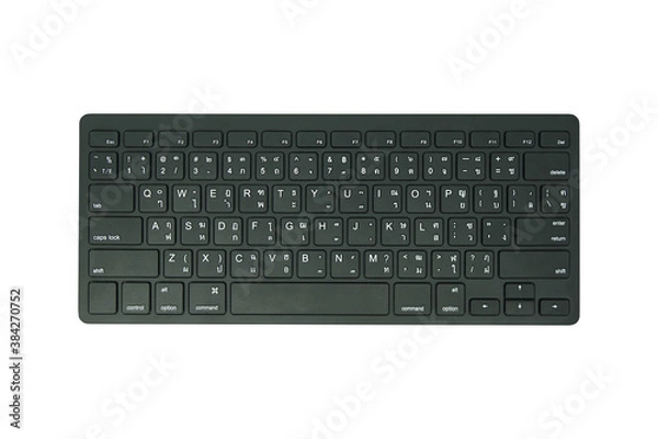 Fototapeta Wireless black computer keyboard  and isolated on white background