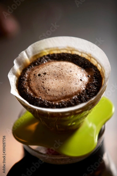 Obraz pouring coffee into a cup