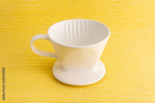 Obraz Drip brewed  coffee on yellow background 