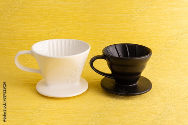 Obraz Drip brewed  coffee on yellow background 