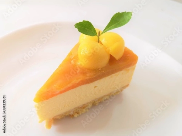 Obraz Mango cheesecake top with fresh mango.