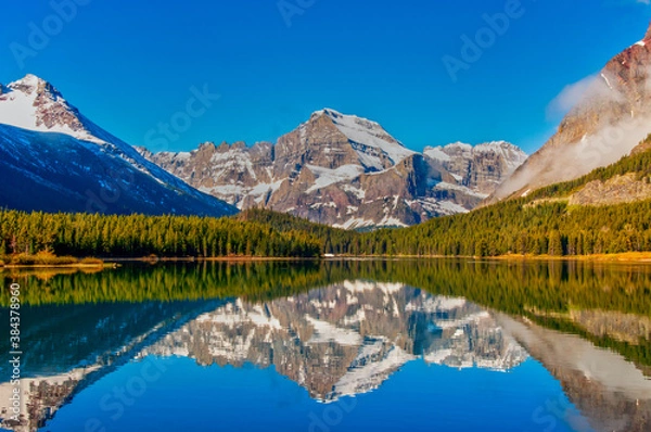 Fototapeta Mirrored Mountains of Glacier National Park