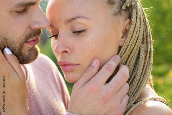 Fototapeta Man with woman kisses. Sensual kiss. Hot foreplay. Sex education and love story.