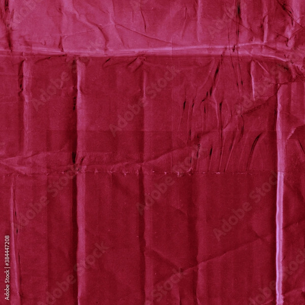 Fototapeta A red vintage rough sheet of carton. Recycled environmentally friendly cardboard paper texture. Simple and bright minimalist papercraft background.