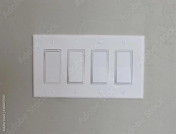 Obraz White modern light switch set on a painted interior wall