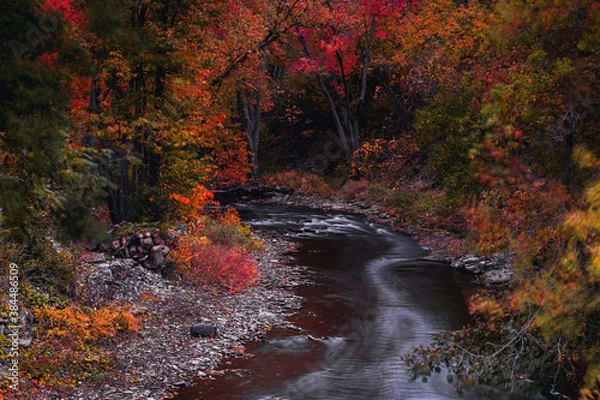Fototapeta Cold air landscapes of rural scenes depicting barns and abandoned homes in fall colour settings around the South East of Ontario Canada in The Greater Napanee and Stone Mills township.
