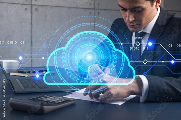 Fototapeta A businessman in office taking notes using phone and storage cloud hologram. Multiexposure. Formal wear.