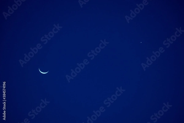 Obraz Crescent moon in sky.